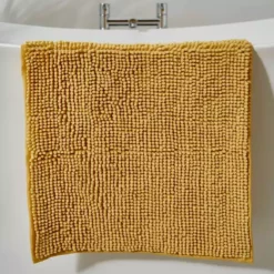 Dunelm Ochre Mini Bobble Bath Mat