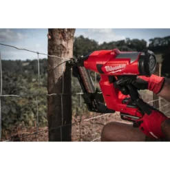 Milwaukee M18 FFUS-0C 18V Fuel Cordless Fencing Stapler (Body Only) -Dunelm Sales Store Fencing Stapler Action Shot 4 30901.1668701183